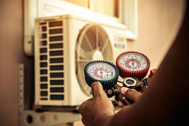 Professional Air Conditioning Service technician working in Pleasant Grove, AL